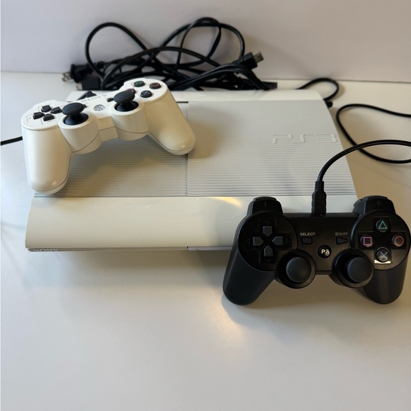 Sony PlayStation 3 Console with Black and White Controllers